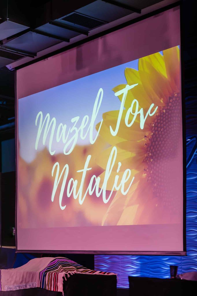 Personalized projection screen during a mitzvah at Nissi’s