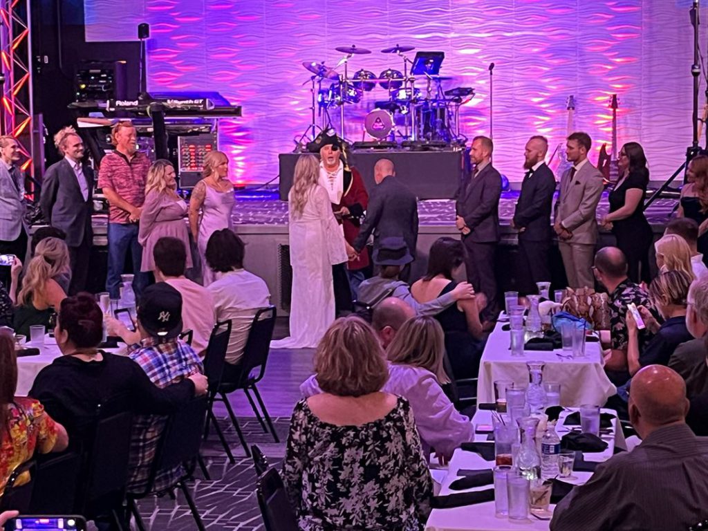 Guests gathered on Nissi’s stage during a celebration