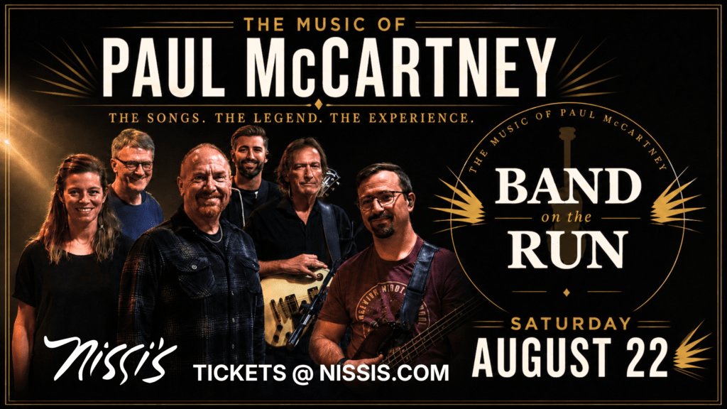 Poster advertising a Paul McCartney tribute concert titled 'Band on the Run,' featuring a group of musicians against a black-and-gold art-deco design with bold white text and gold accents.