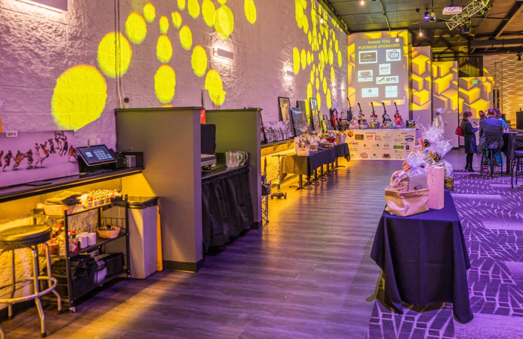 Event tables arranged along the side of Nissi’s room